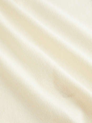 Top Coco — Peplum & Botones Dorados